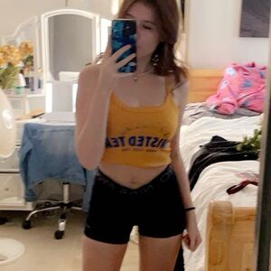 yellow twisted tea shirt in a kids size medium worn once self cut/self made
